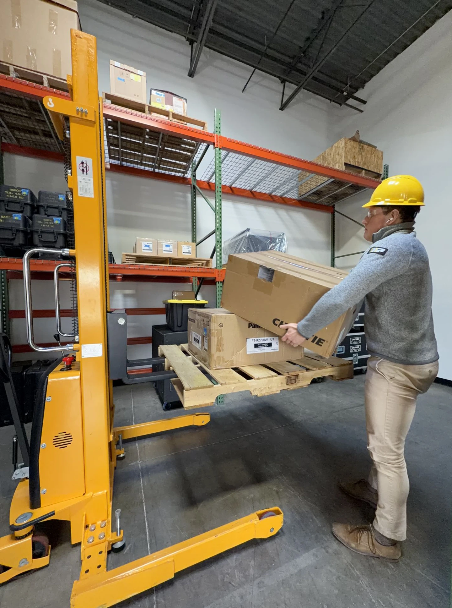 Professional AV equipment prepared for pickup, freight, and warehouse inspection