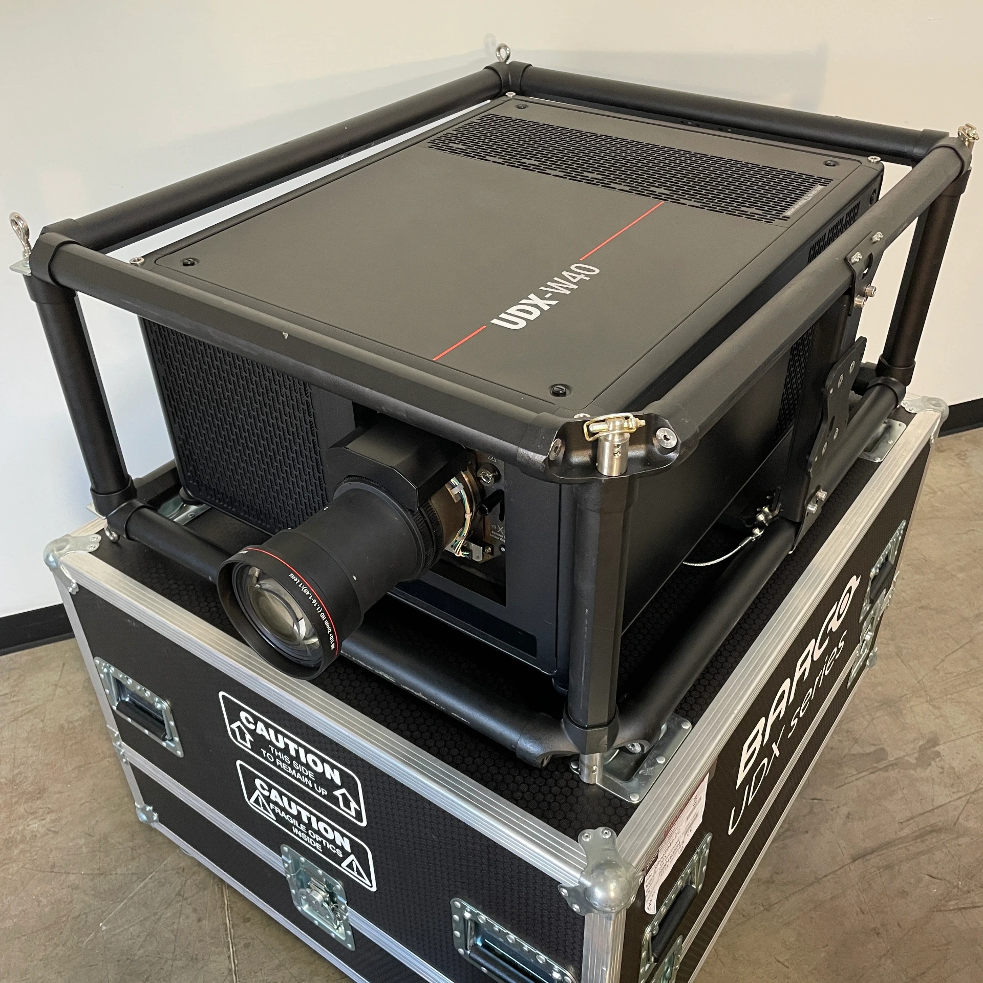 [V061] Barco UDX-W40 FLEX 40,000 Lumen Laser Projector w/ TLD+ Lens, Frame & Case [Refurbished]